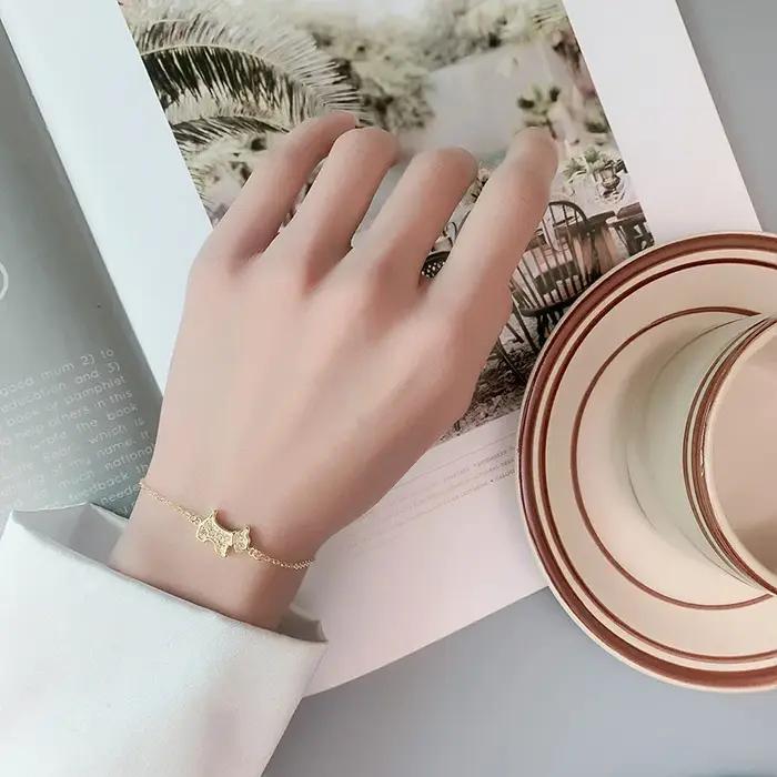 Bracelet en argent sterling 925 serti de zirconium avec breloque chien élégant à offrir pour femmes occasions spéciales