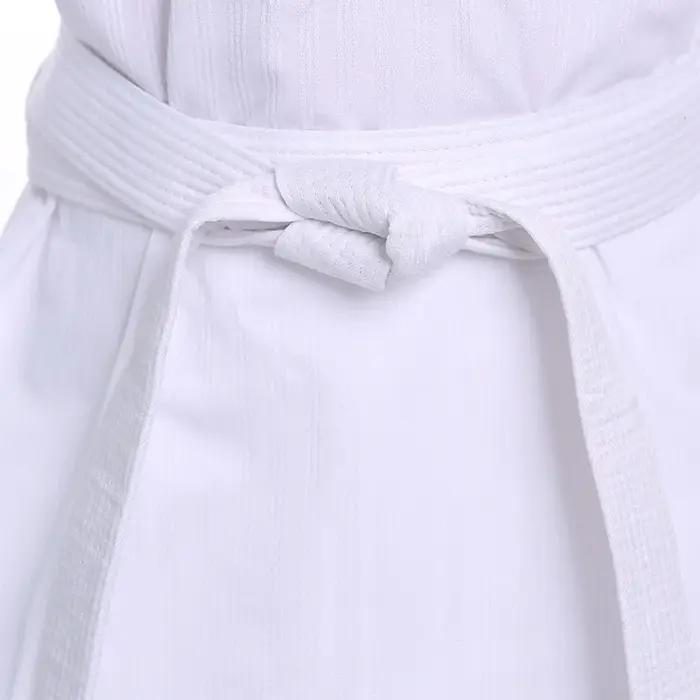 Nouveau uniforme Gi à manches longues Costumes TKD vêtements uniformes de Taekwondo blancs WTF karat